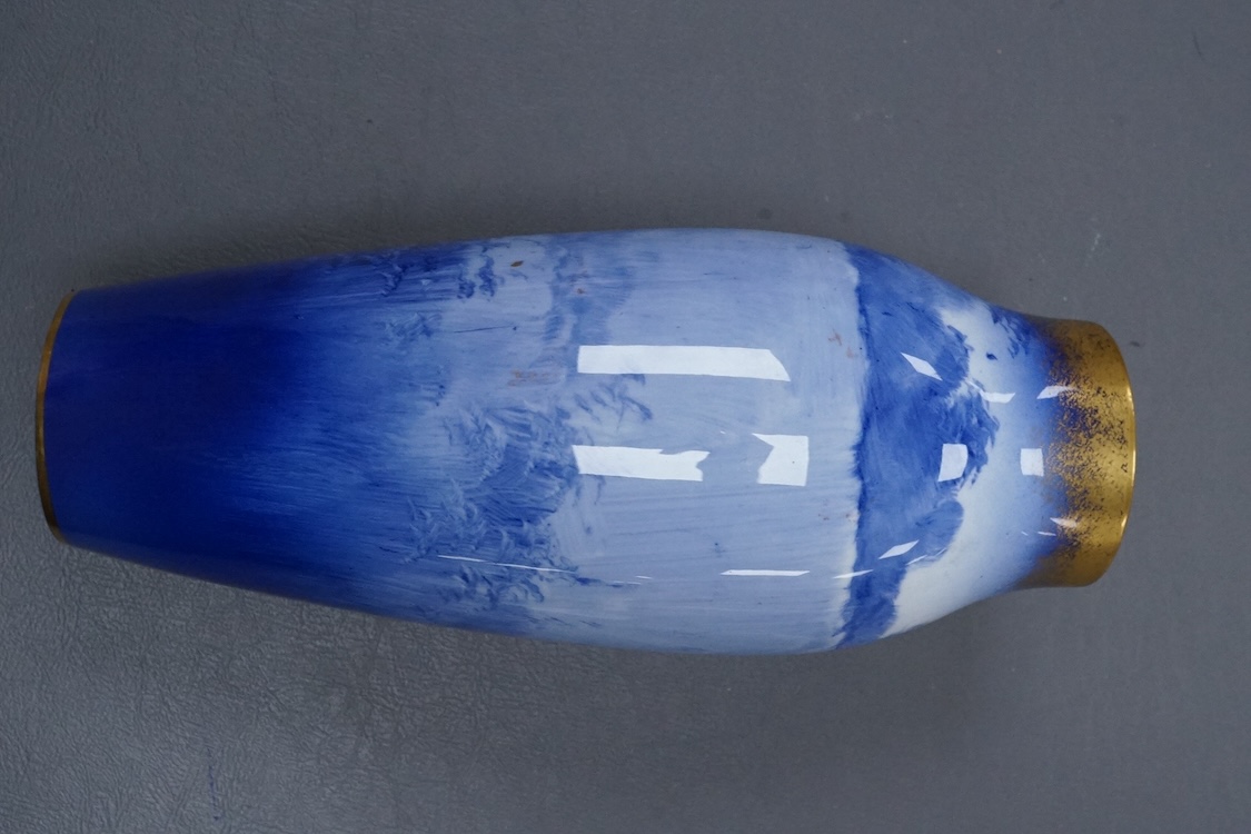A Royal Doulton figural vase painted in blue with gilt top, 22cm high